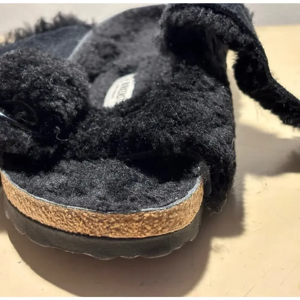 Birkenstock black shearling Sandals.